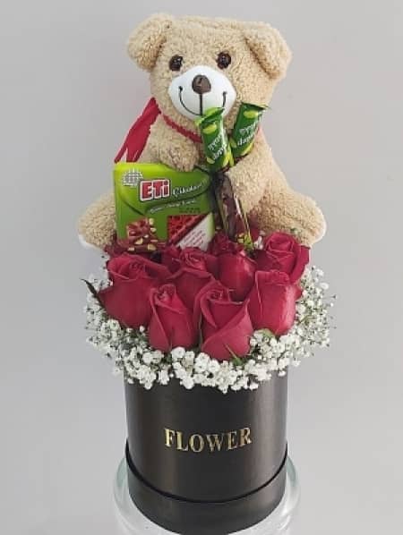 Box contains 7 Rose Chocolates and a Teddy Bear Box contains 7 Rose Chocolates and a Teddy Bear
